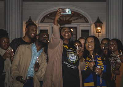 Students hold a candlelight vigil in honor of Dr. Martin Luther King in 2019, the event is held annually to celebrate the great civil rights leader.